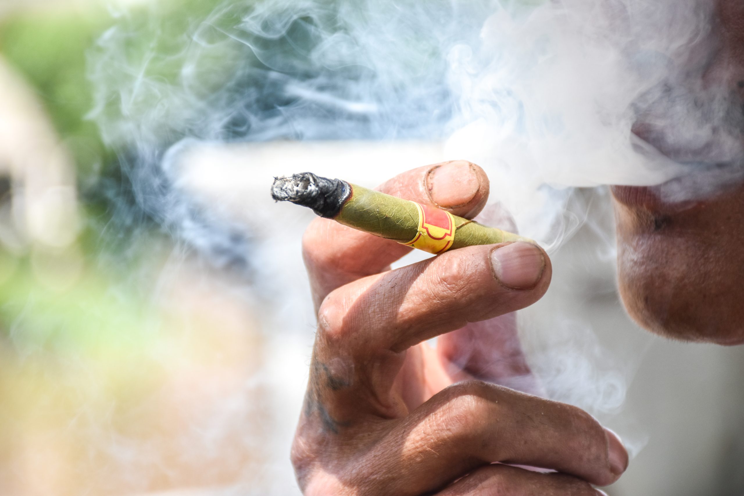 close-up-hand-holding-cigarette